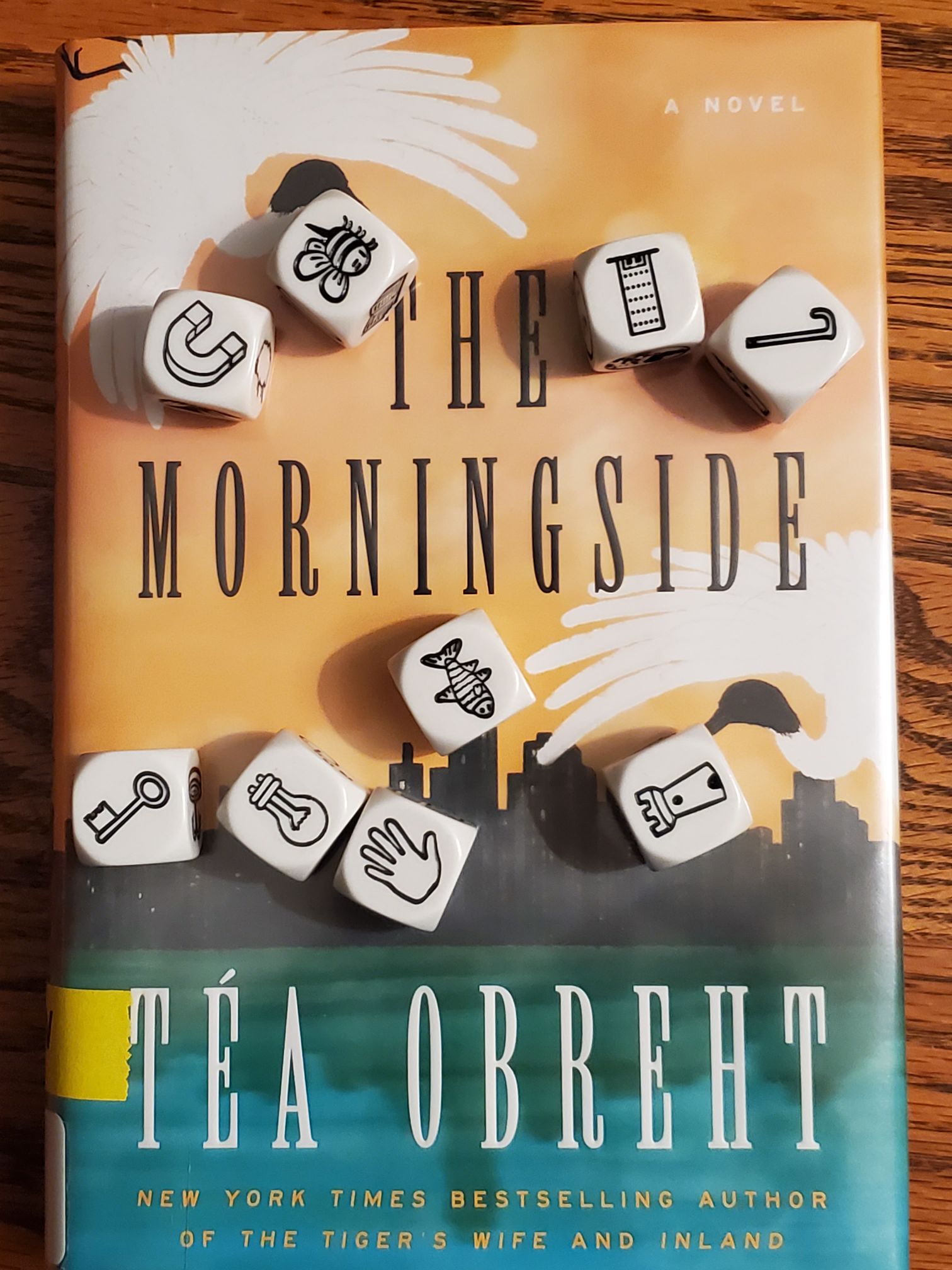 Saturday Story Cubes 6 on top of Téa Obreht's The Morningside