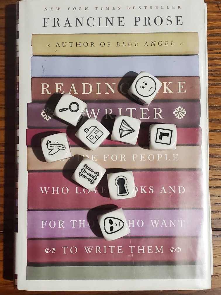 Saturday Story Cubes on top of Francine Prose's "Reading Like A Writer"