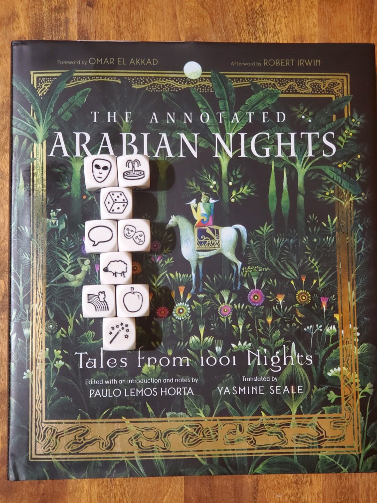 Story Cubes on top of Yasmine Seale's translation of "The Annotated Arabian Nights"