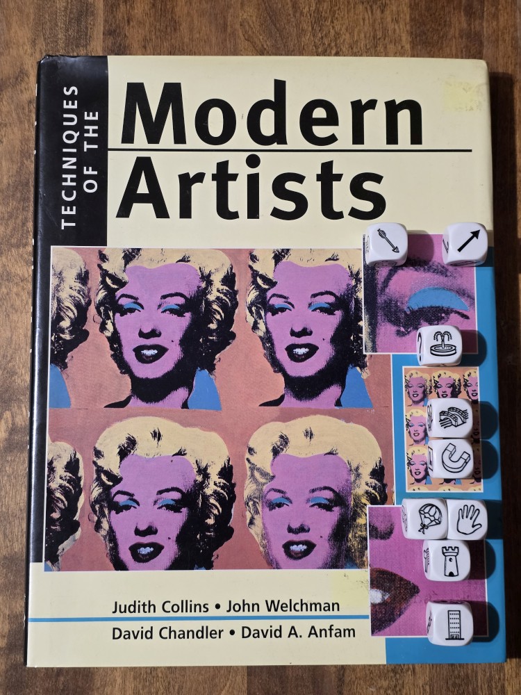 Story Cubes story on top of Techniques of the Modern Artists by Collins, et al.