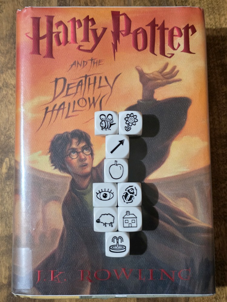 Story Cubes story on top of Harry Potter and the Deathly Hallows by J. K. Rowling